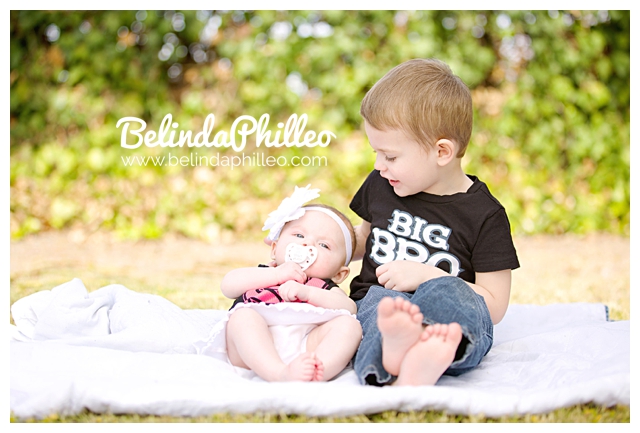 big brother with his baby sister