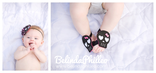 baby wearing skull headband and booties