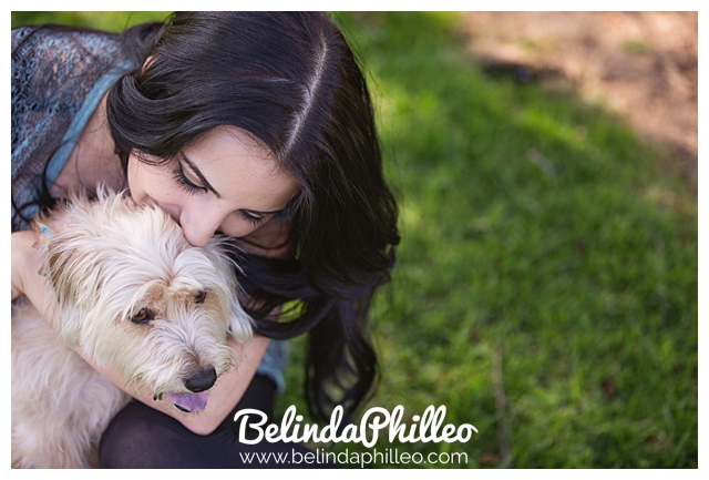 woman hugging her wheaten terrier