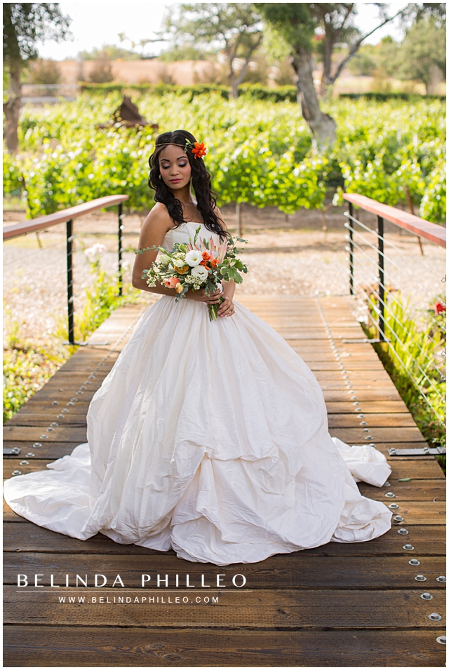 bride admiring her flowers