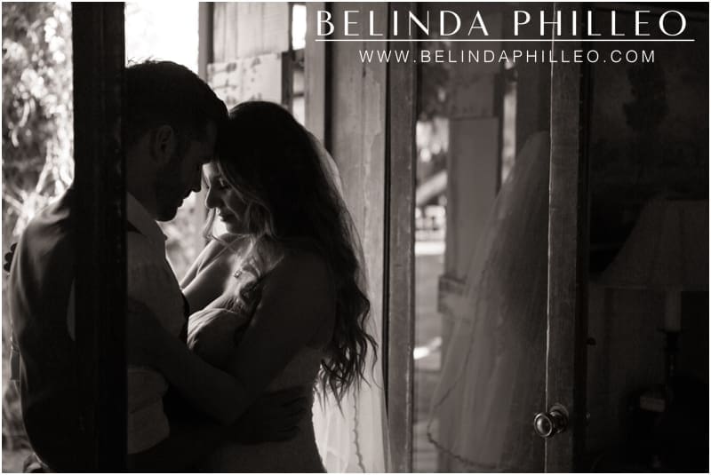 Bride and groom share a romantic moment on their wedding day at the Casa Cody Inn, Palm Springs, CA