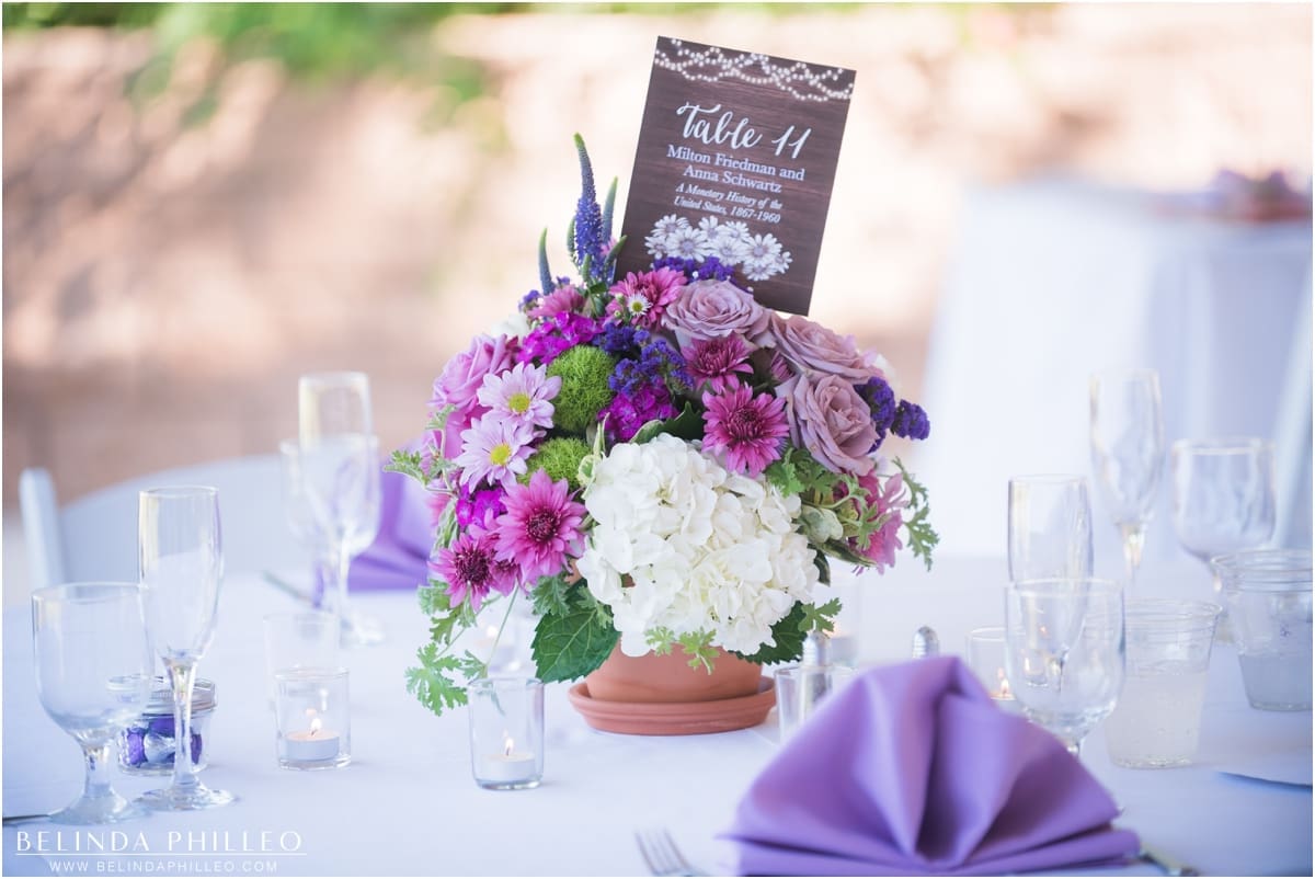 White and purple centerpieces for a El Dorado Golf Course wedding in Long Beach, CA