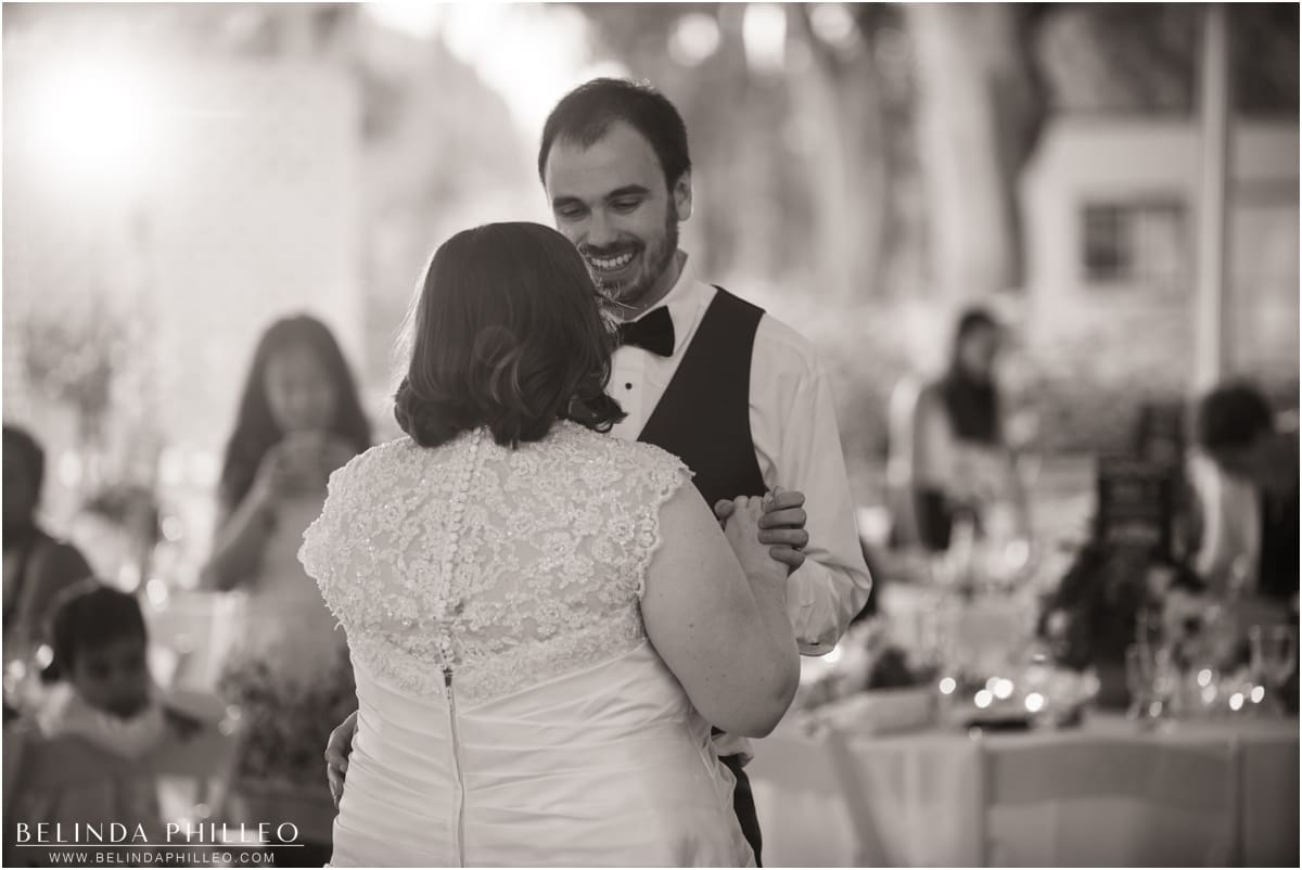 Bride and groom share first dance at El Dorado Park Golf Club wedding in Long Beach, Ca