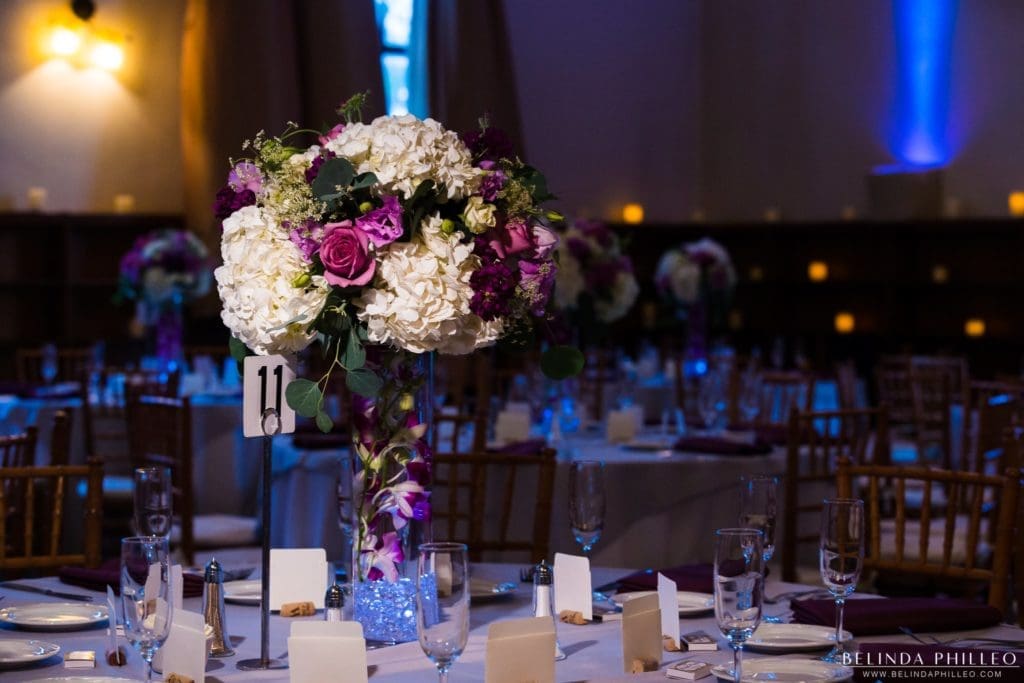 Purple Rose and white Hydrangea centerpieces at Redondo Beach Historic Library Wedding. Photo by Belinda Philleo