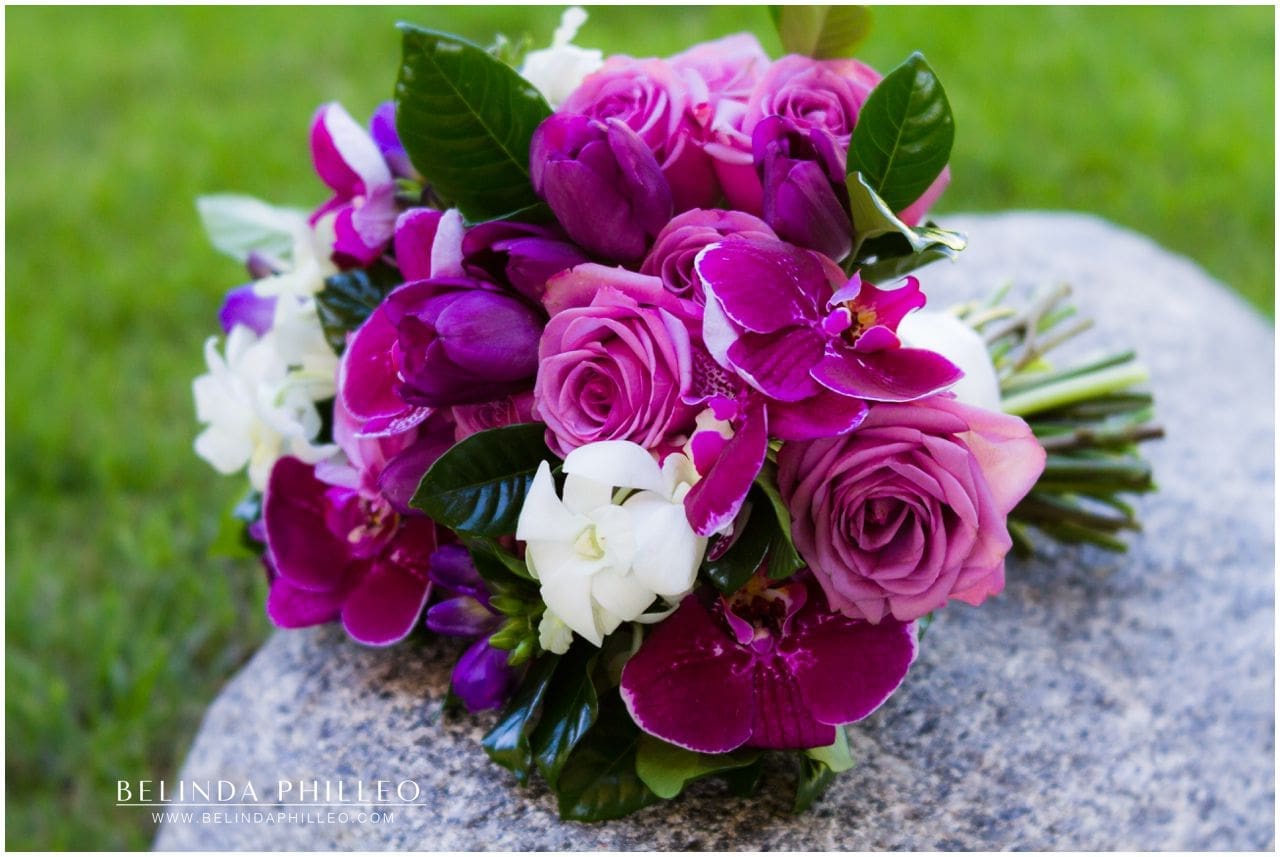 Friendly Hills Country Club wedding bridal bouquet of purple roses and orchids created by Violette's Flowers.