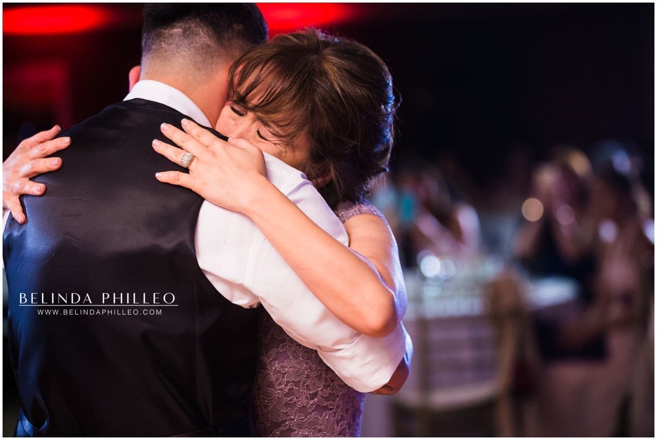 Groom's mother get's emotional during mother-son dance at Friendly Hills Country Club wedding