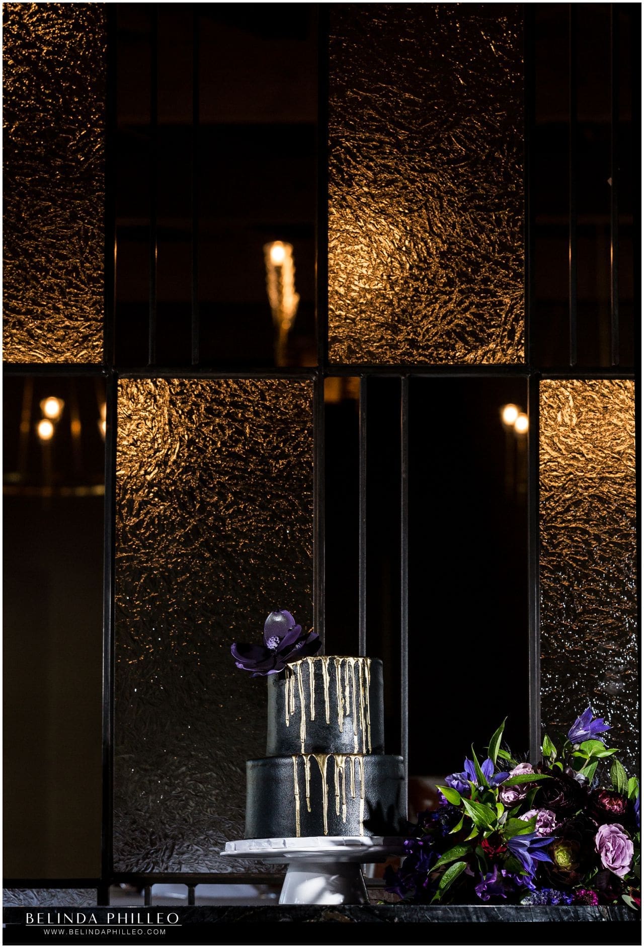 Purple & black wedding inspiration. Black wedding cake created by Great Dane Bakery Los Alamitos, CA