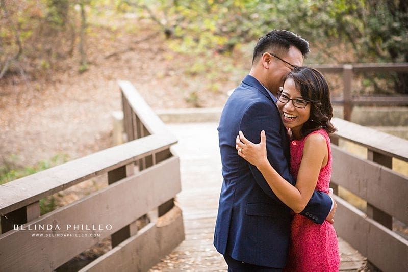 Couple having fun during their Oak Canyon Nature Center engagement photos by Belinda Philleo