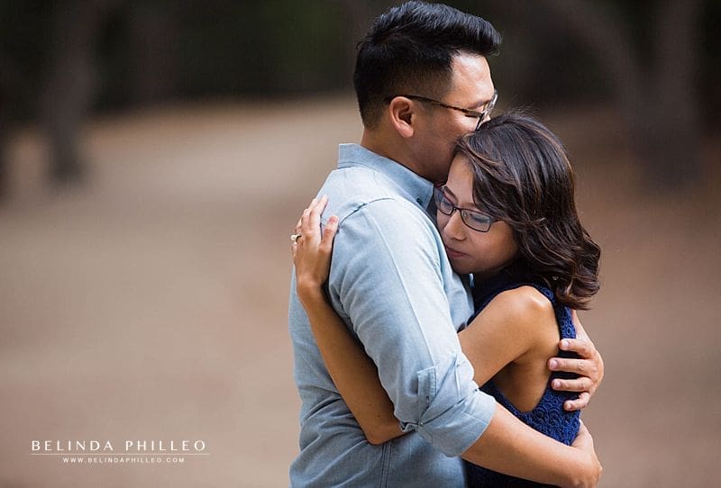 Couple shares a tender hug during their Oak Canyon Nature Center engagement photos by Belinda Philleo