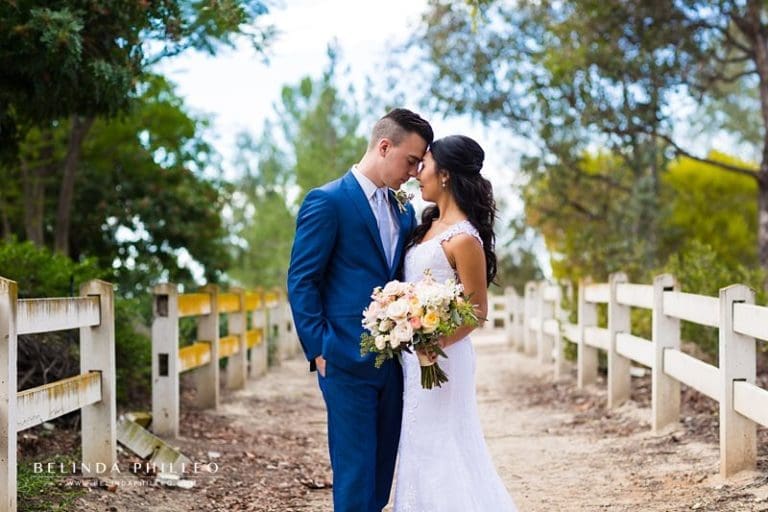 Dove Canyon Courtyard Wedding with Navy Blue and Pastel Hues