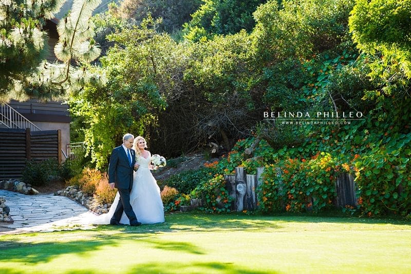 Bride is walked down the aisle at The Ranch at Laguna