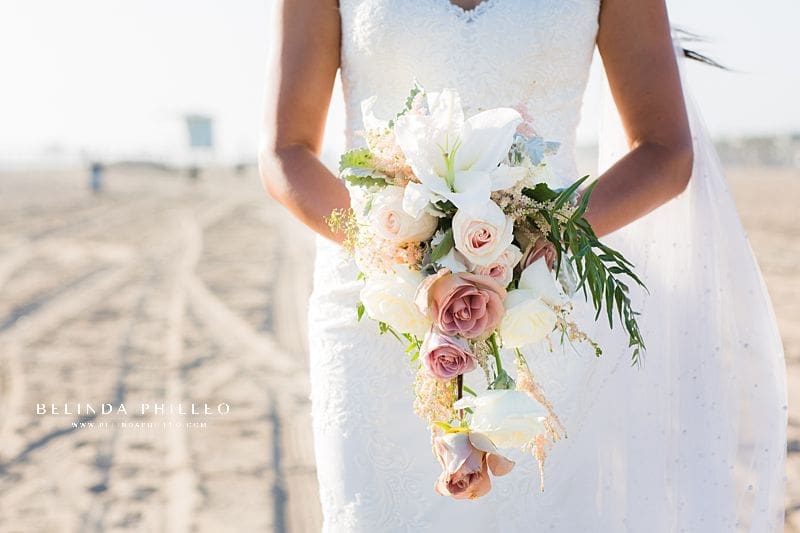 Soft and tropical bridal bouquet created by Serenade of Flowers in Orange County, CA. Photo by Belinda Philleo