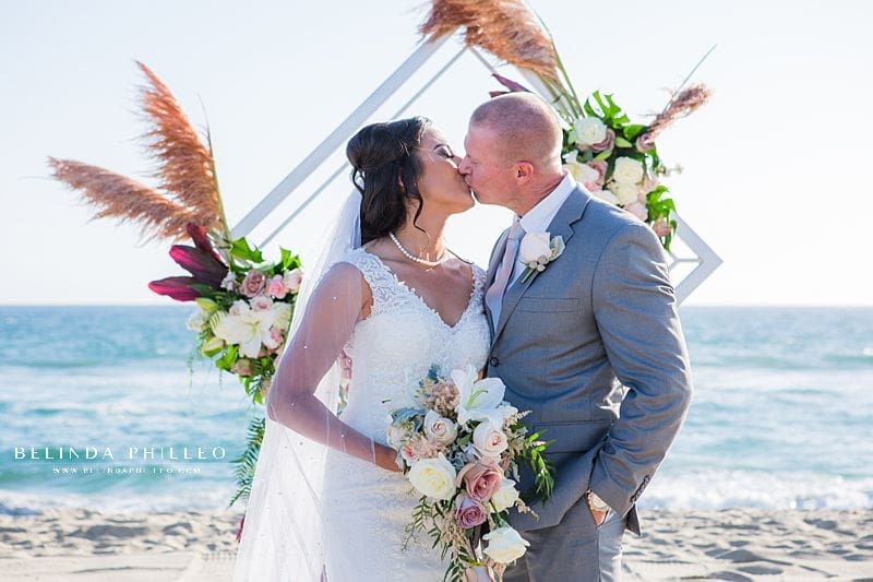 Romantic bride and groom portraits at Huntington Beach wedding