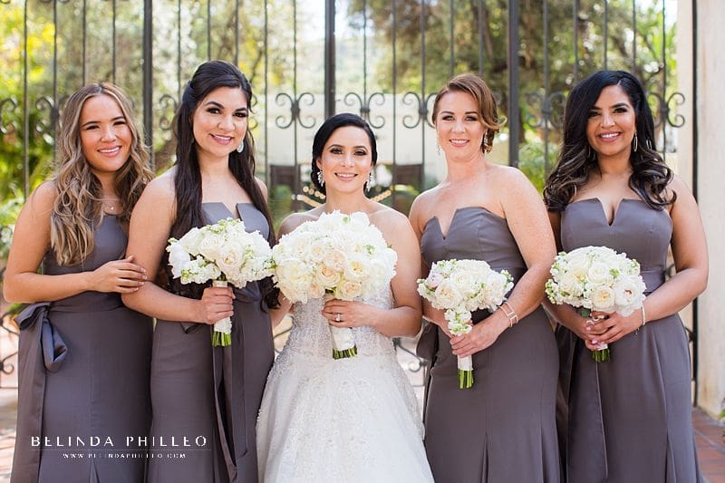 Bride and bridesmaids portrait. Bridesmaid gowns White by Vera wang v-wire crepe mermaid in Charcoal, Bride's gown Martina Liana Carmen + Sander style