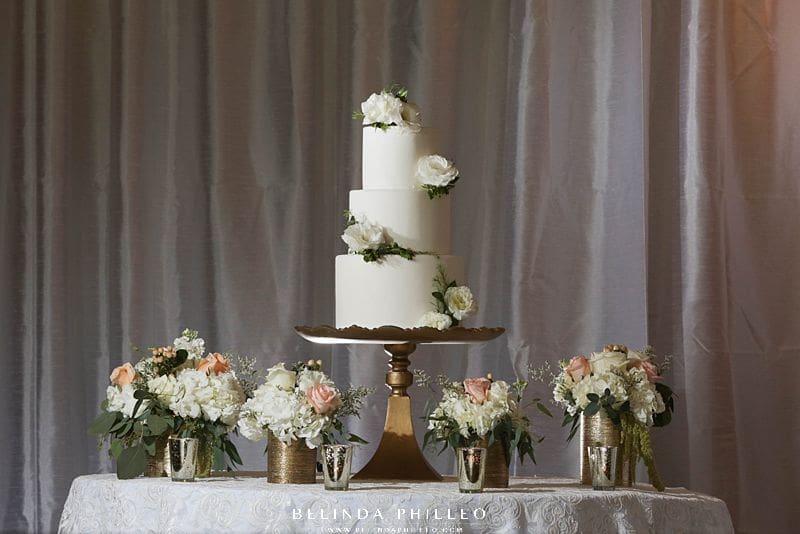 All white wedding cake from Simply Irresistible Cakes & Catering. Orange County catering services
