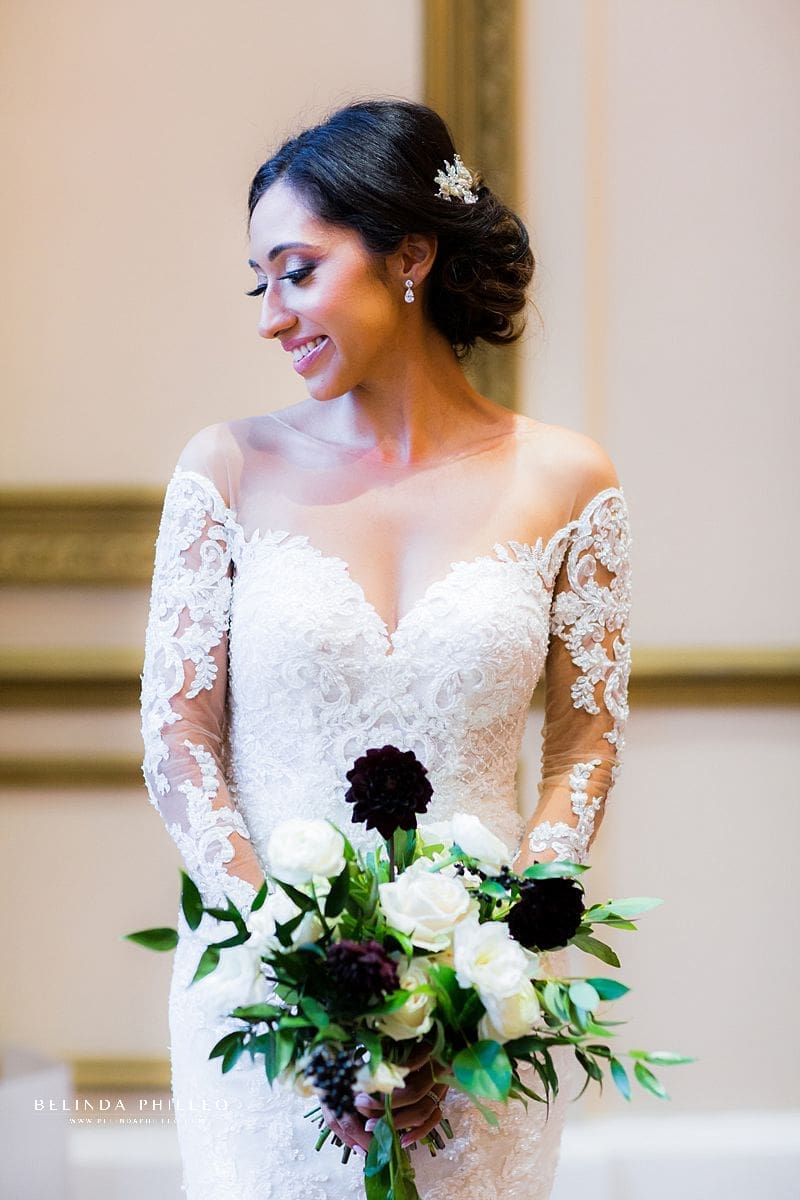 Glamorous Los Angeles bride in her Martina Liana gown at Alexandria Ballrooms, Los Angeles, CA. Los Angeles wedding Photography by Belinda Philleo
