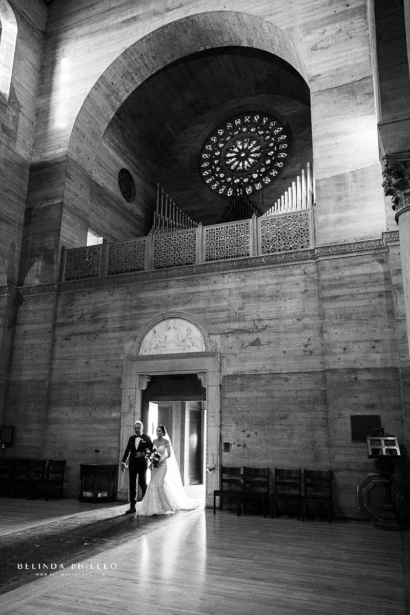 Los Angeles wedding photography by Belinda Philleo. Bride is escorted into St John's Cathedral by her father.