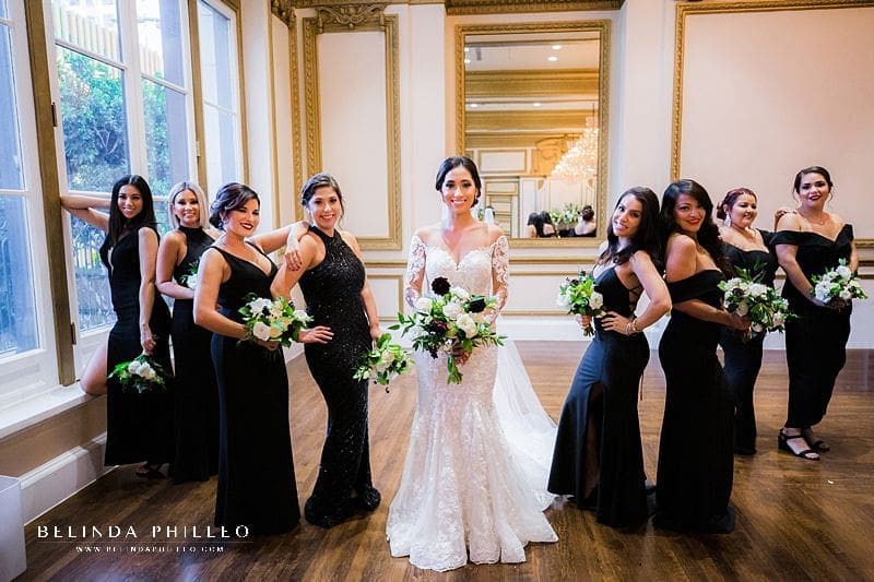 Black bridesmaid gowns. Wedding at Alexandria Ballrooms in Los Angeles, CA