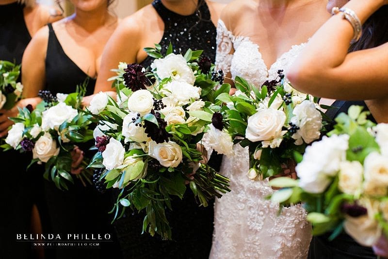 Dramatic white and oxblood bridal bouquets by Flora Sky for DTLA wedding at Alexandria Ballrooms