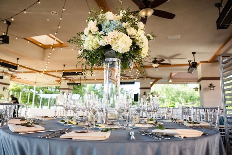 Soft blue and white reception decor at Coto De Caza Golf Club wedding in Orange County, CA
