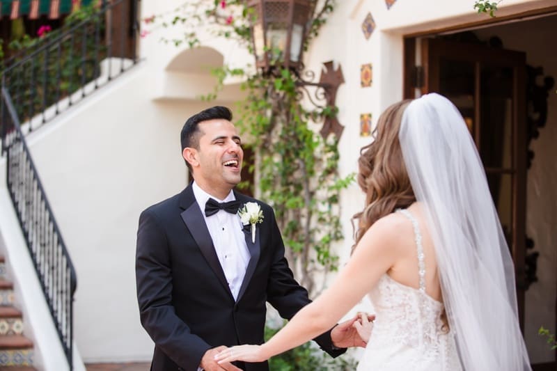 Bride and groom enjoy their first look at Hummingbird Nest Ranch wedding