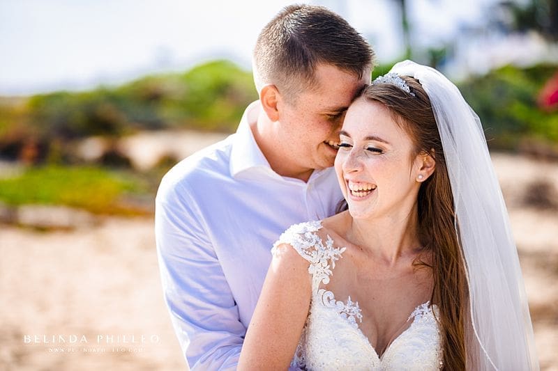 Newlyweds share a laugh during their Newport Beach elopement