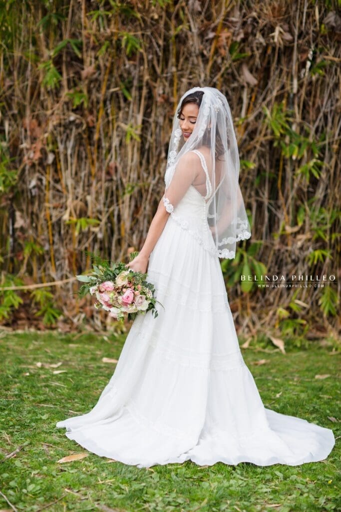 Bride shows off her bohemian style Justin Alexander gown
