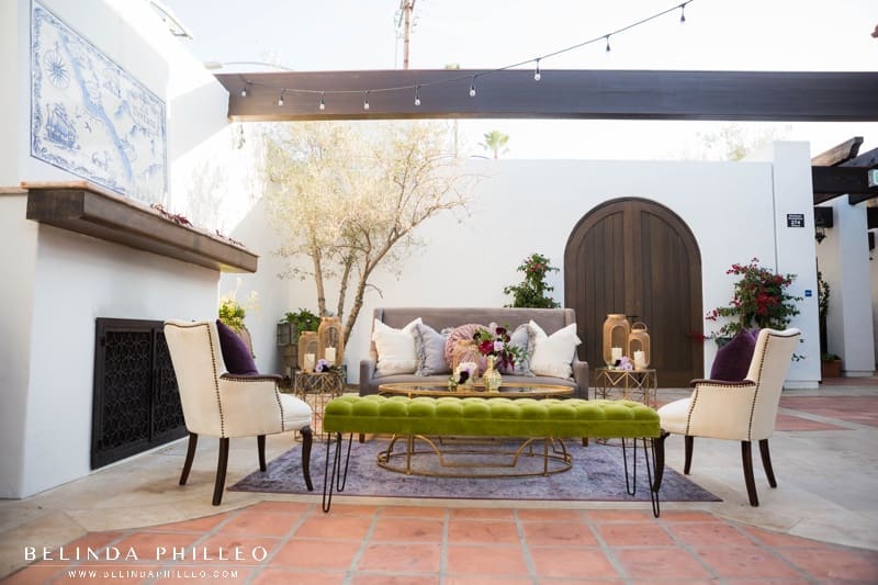 Cozy cocktail hour decor outdoors by the fireplace at La Ventura Event Center in Orange County, CA Outdoor wedding venues in orange county
