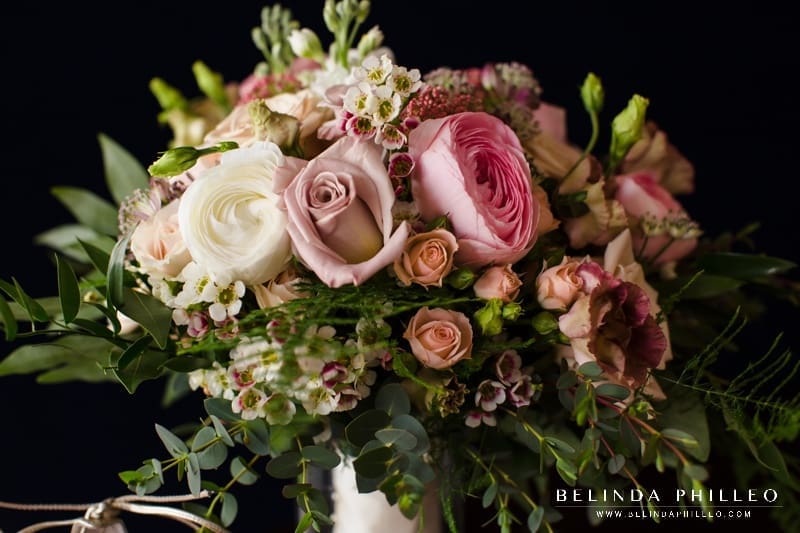Spring bridal bouquet with soft pink roses and ranunculus