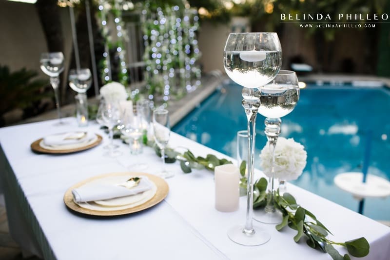 White and gold sweetheart table with eucalyptus 