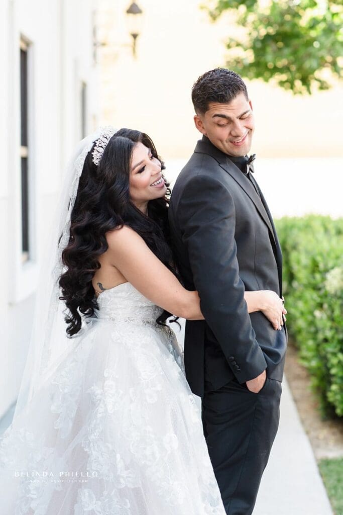 Bride and groom at their wedding in Westminster, California. Photo by Belinda Philleo