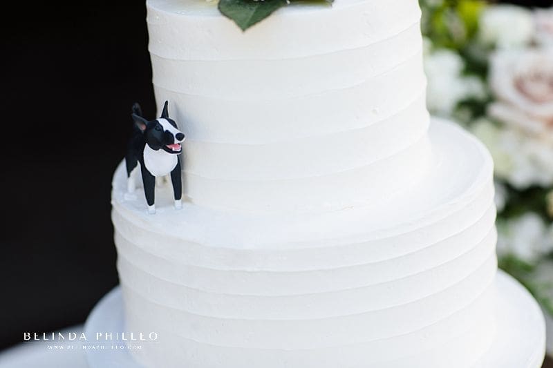 Dog statuette on wedding cake
