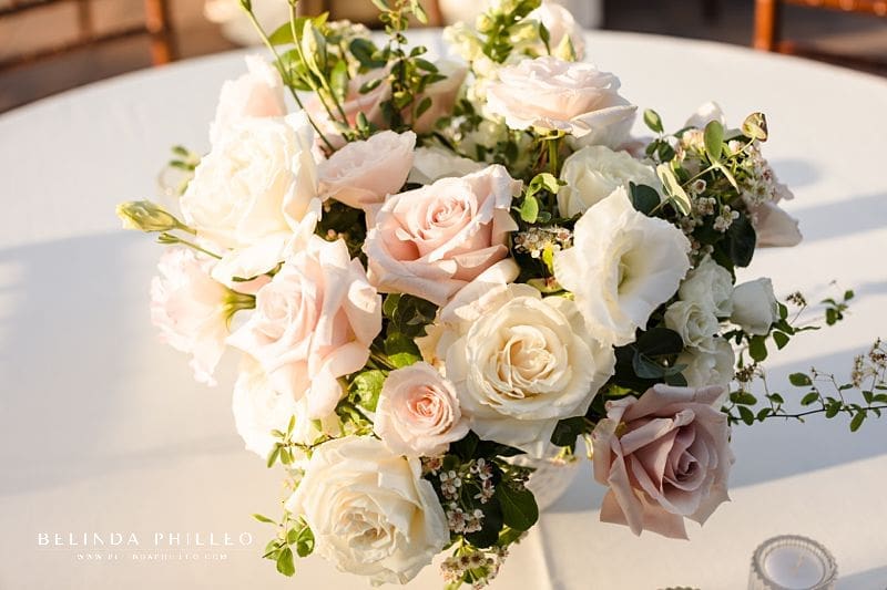 blush and white rose centerpieces at Strawberry Farms Golf Club wedding celebration