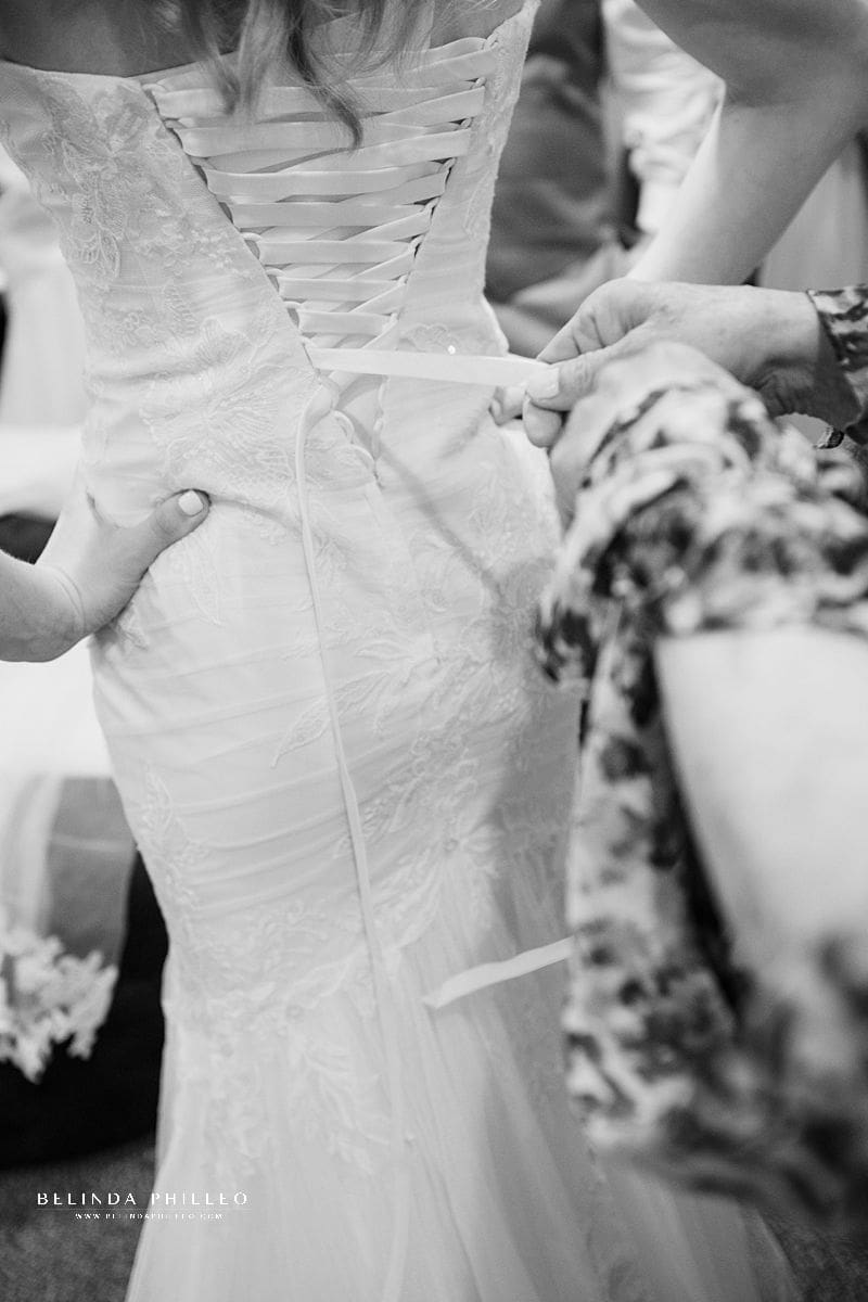 Lace up back of Oleg Cassini CWG926 bridal gown from David's Bridal