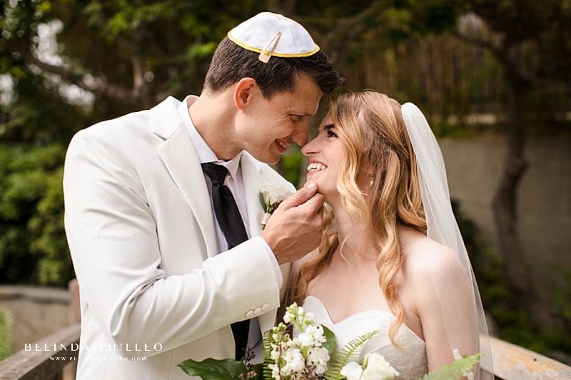 Bride and groom share an intimate moment during garden wedding at JACCC Los Angeles, CA