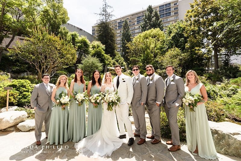 Bridal party poses for a photo at JACCC garden wedding, Los Angeles.