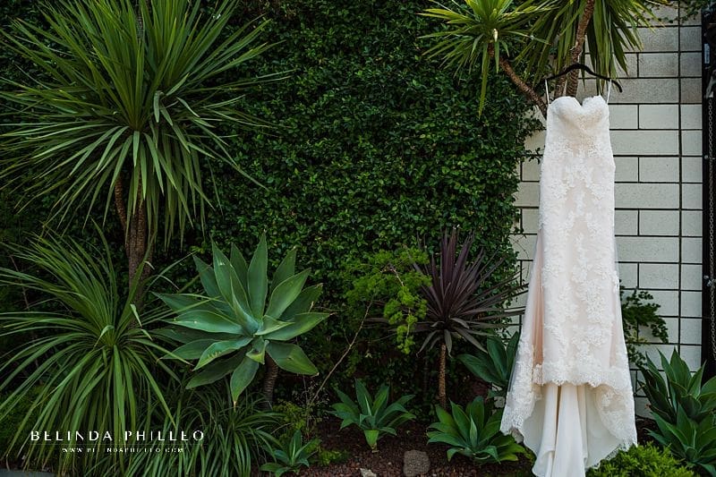 Bridal gown hangs outside Smogshoppe wedding in Los Angeles