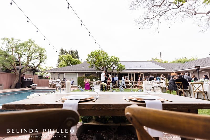 Wide angle view of a backyard wedding reception