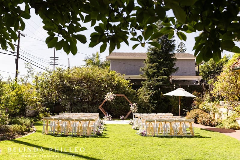 A wedding ceremony setup on the lawn of The French Estate in Orange, CA